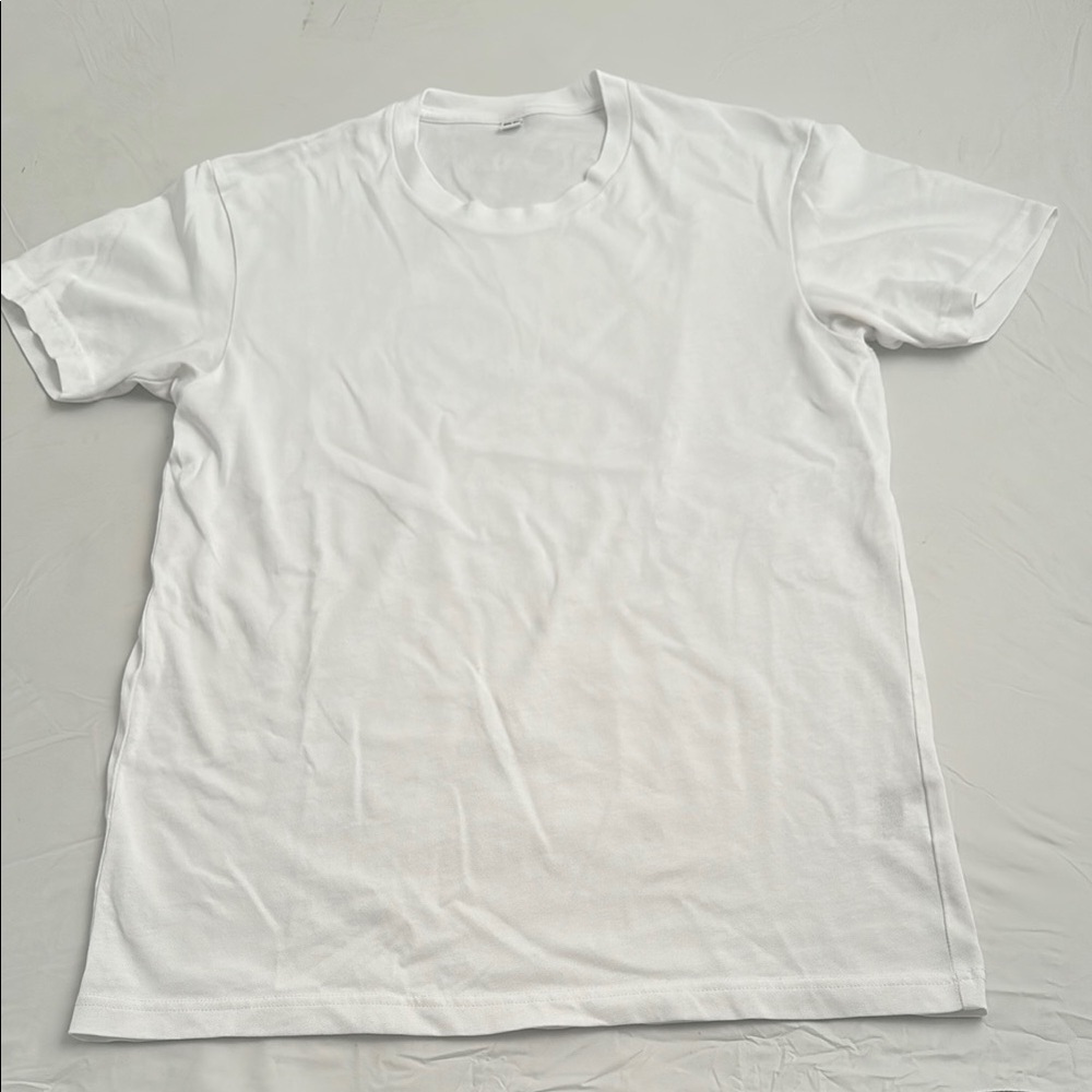 Uniqlo white crew neck short sleeve t-shirts TWO SHIRTS